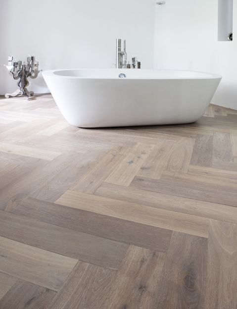 Use parquet in the bathroom for a warm and luxurious feel.