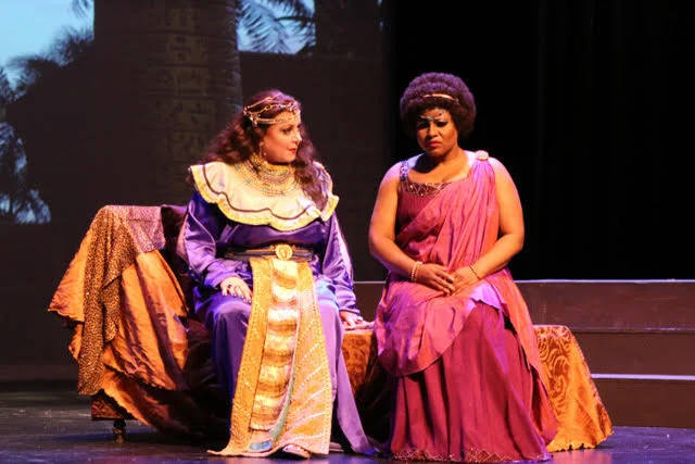 Boheme Opera New Jersey Conductor: Joe Pucciatti Costumes: Kierceton Keller Set: John Russell Projections: Matthew Root Lighting: Mike Voytko Wigs and Makeup: Patti DelSordo Photos: Ed Kedzierski