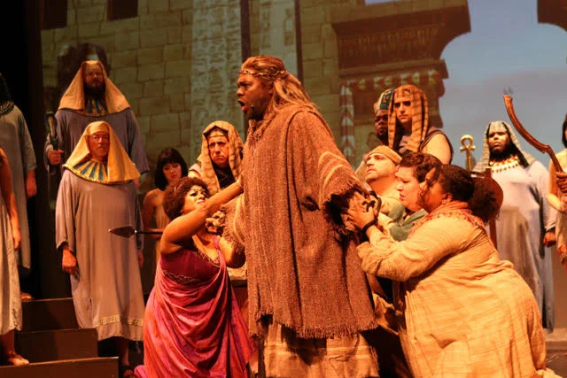 Boheme Opera New Jersey Conductor: Joe Pucciatti Costumes: Kierceton Keller Set: John Russell Projections: Matthew Root Lighting: Mike Voytko Wigs and Makeup: Patti DelSordo Photos: Ed Kedzierski