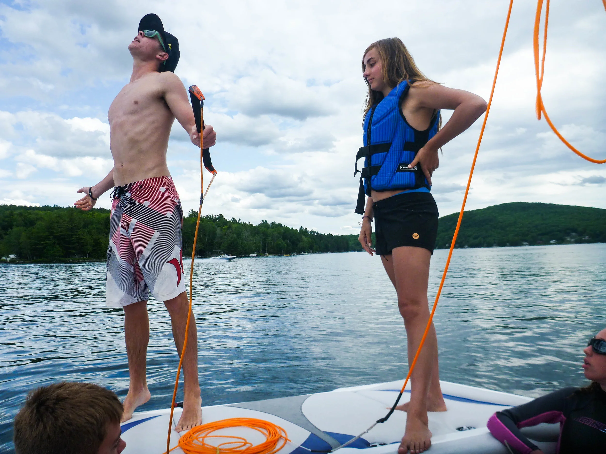 Summer camp lake instruction wakeboard