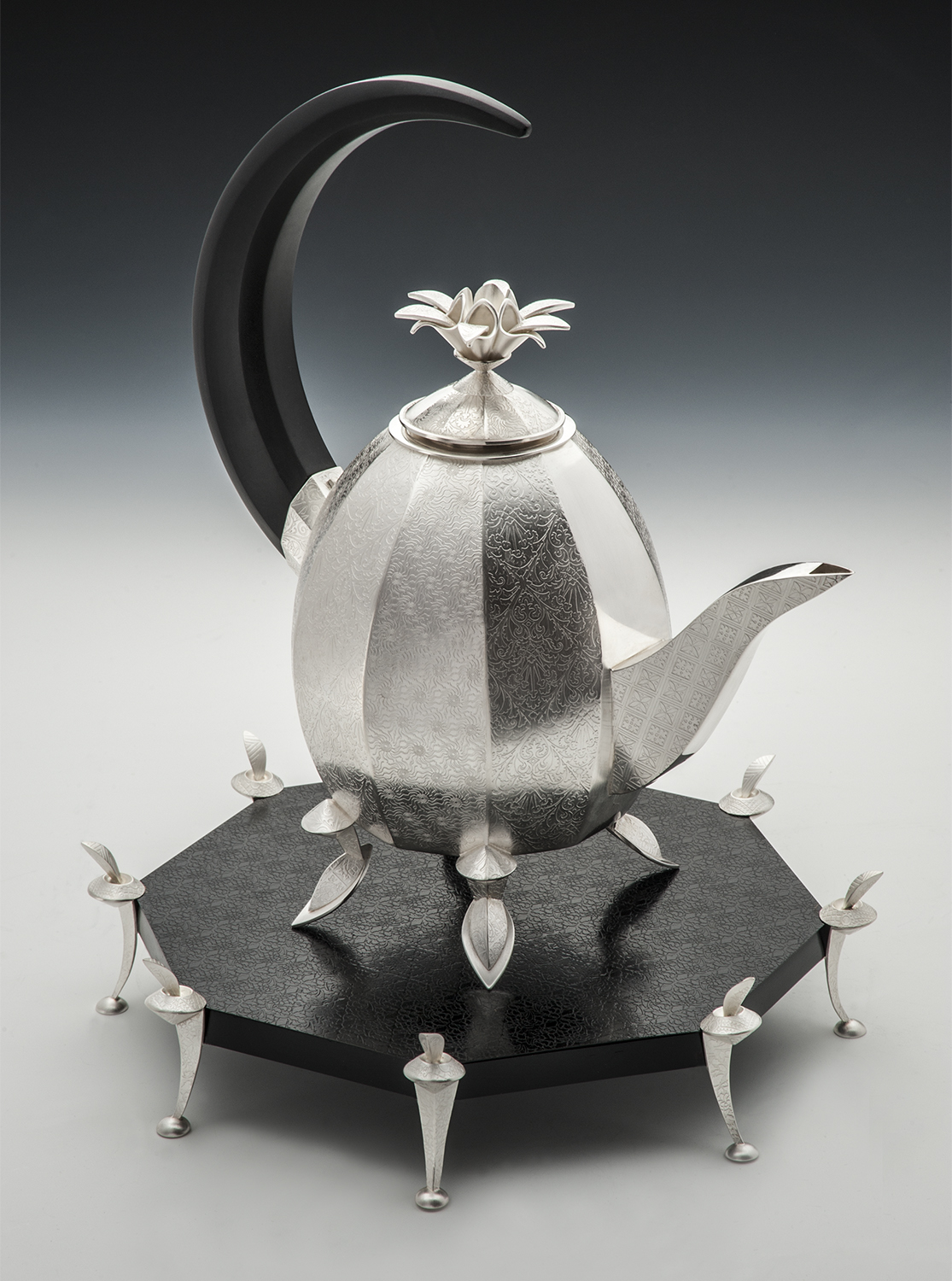 Slippers Teapot  |  2000  |  sterling silver, maple, micarta  |  13 x 10 x 10 inches