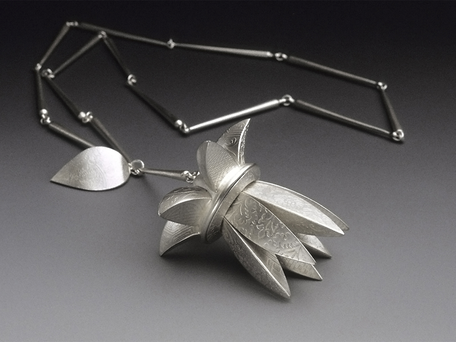Flower Pendant  |  2000  |  sterling silver  |  3.125 x 2.675 x 2.675 inches