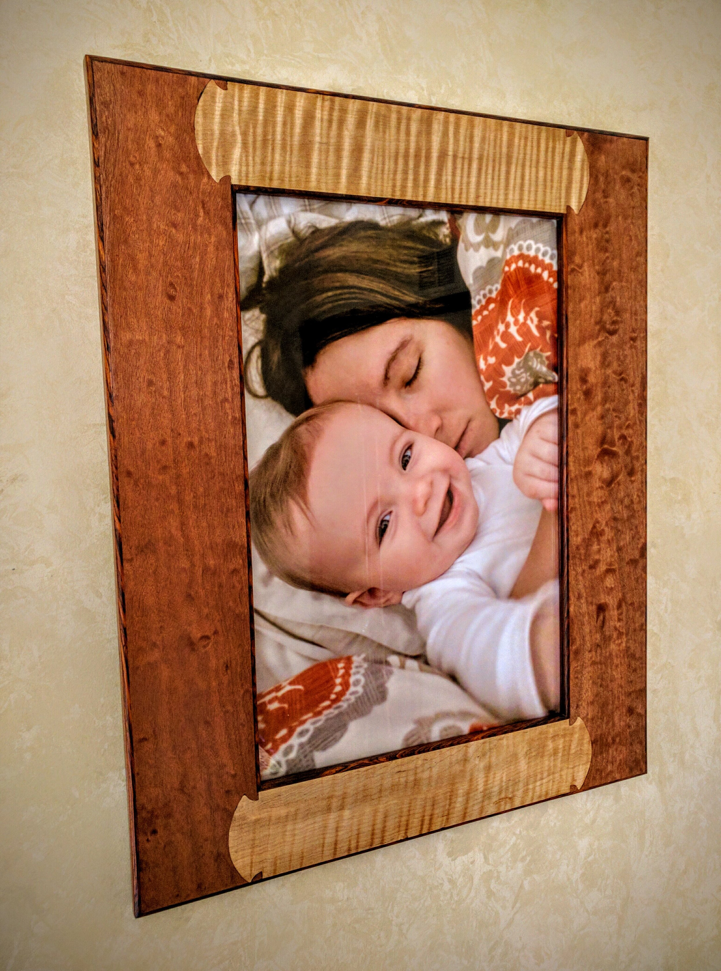 Prox Frame #1 $1,250 Shown in Cocobolo, heavily figured Makore and Maple. Fits 12"x18" Photo.