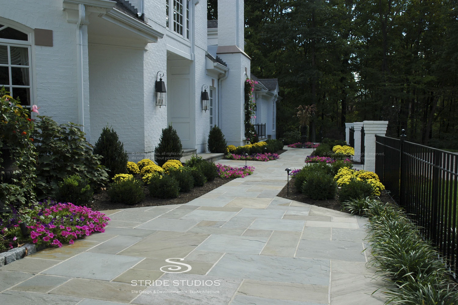 02-stride-studios-entry-stone-walk-fence.jpg