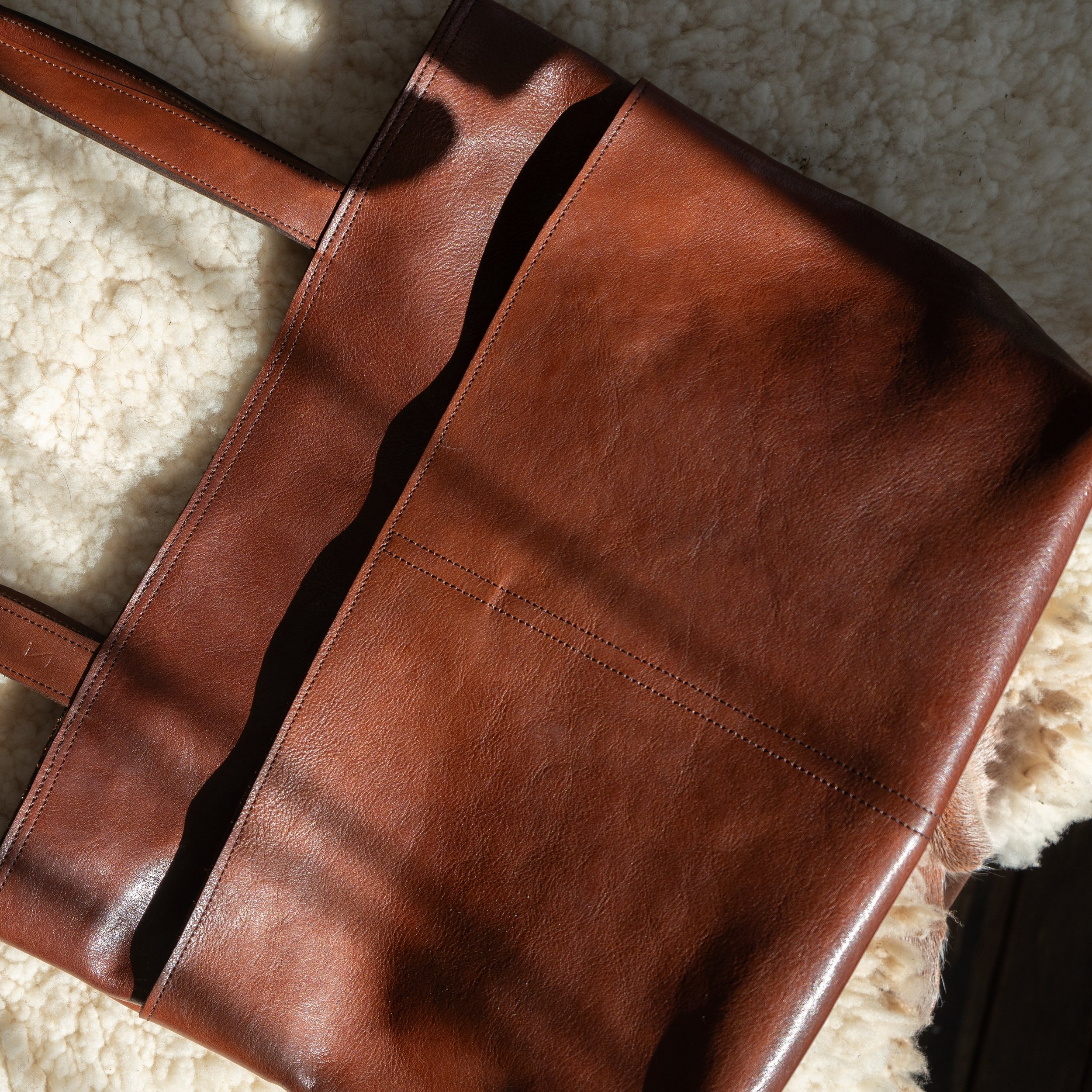 Leather and shearling.

#luxurydesign #luxuryinteriors #luxurylifestyle #leathergoods #luxury #leatherbag #nycstyle #designnyc