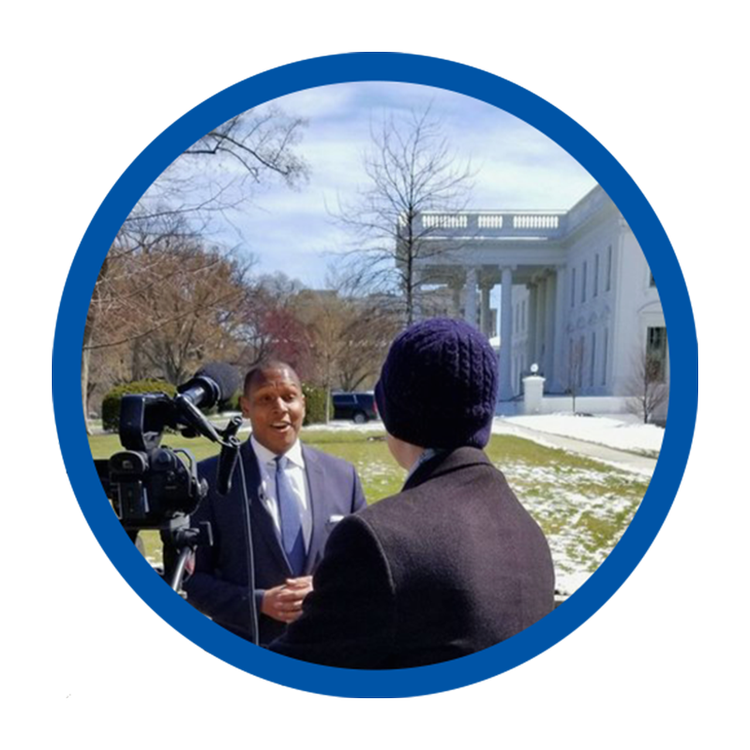 Stephen Rowe giving a television interview on the White House North Lawn