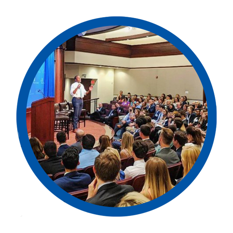 Stephen Rowe speaking to a full auditorium at the Heritage Foundation