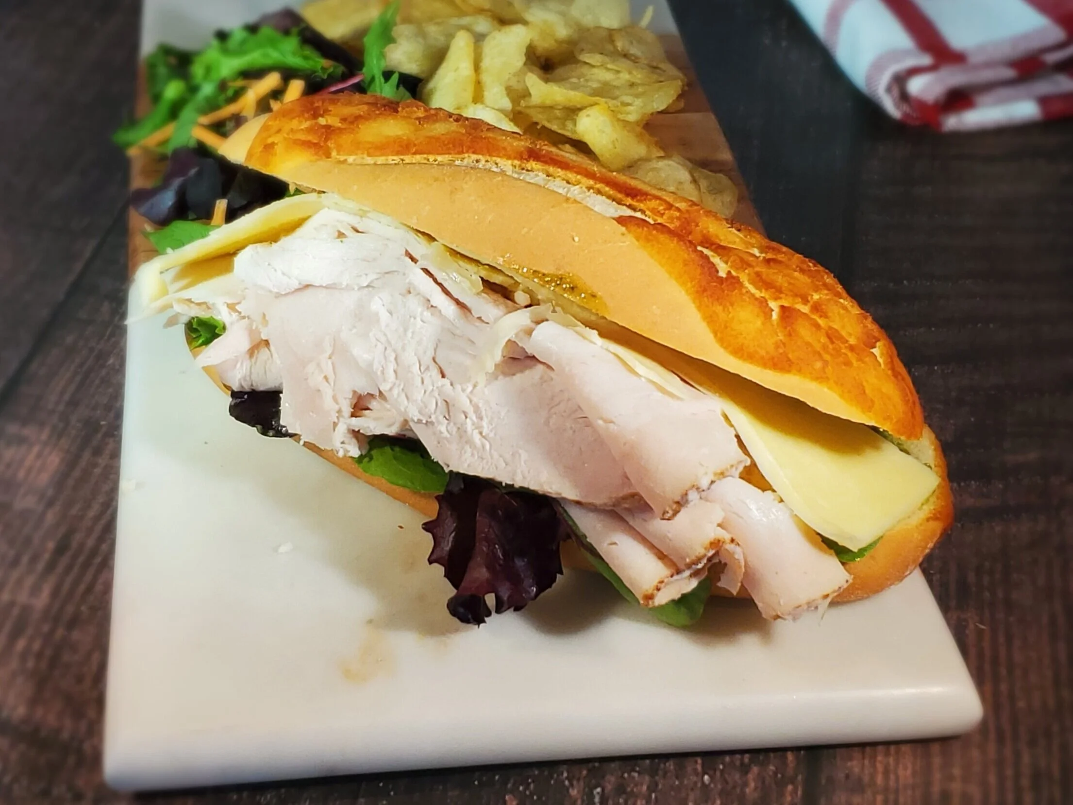 Turkey Pesto Club Sandwich, $10.00