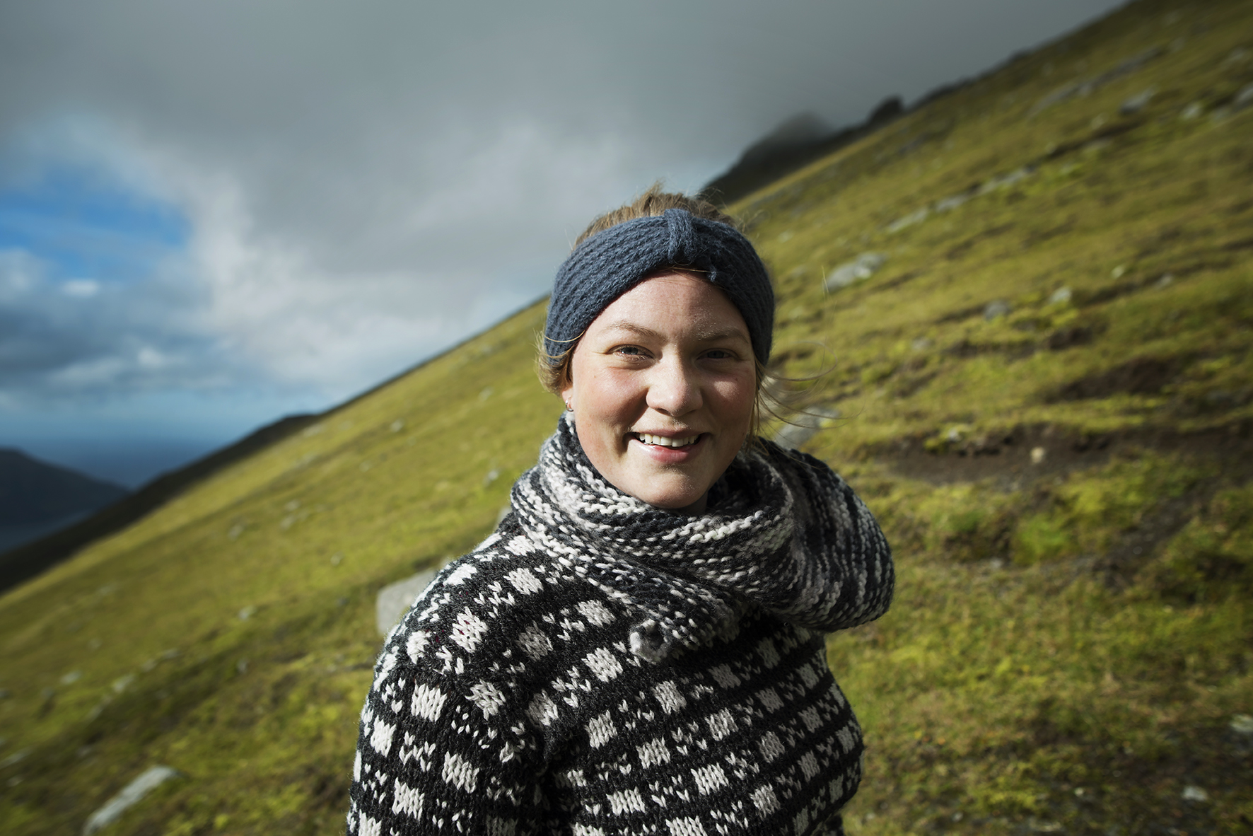 Thea photographed by Mark on the way up Slættaratindur, the highest mountain on the Faroe Islands. We hiked this mountain three times to get the right weather conditions for filming. 