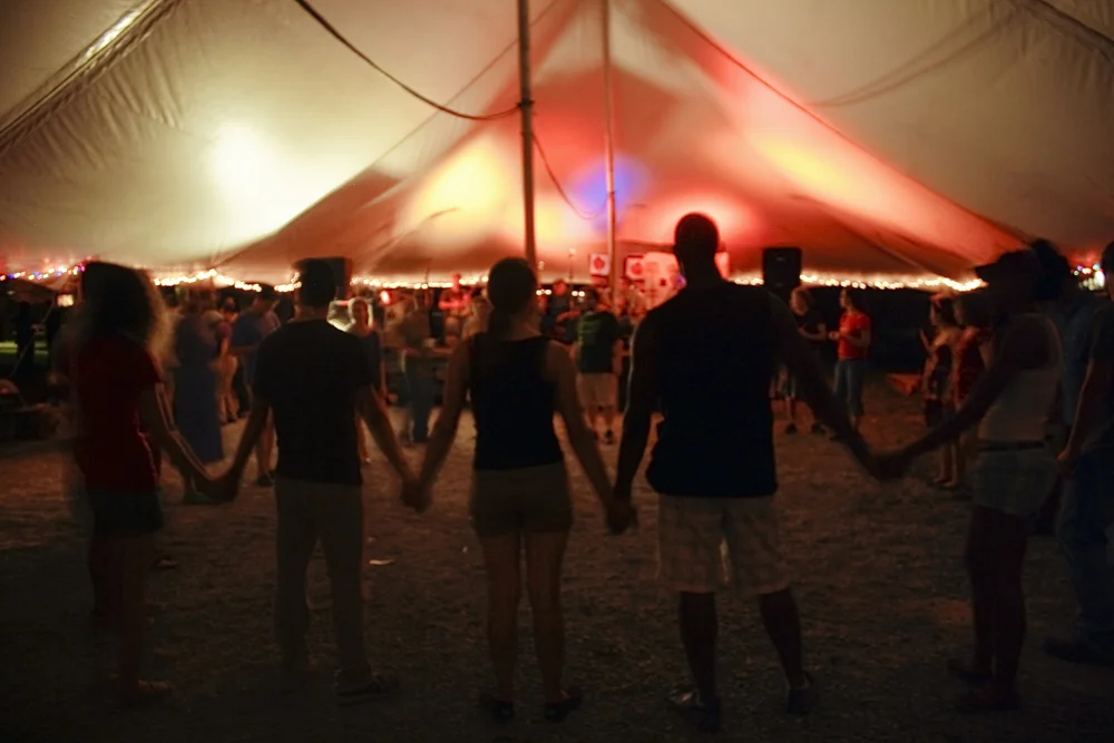 Photo-Credit-Rachel-R.-Hagan-Exchange-members-circle-up-to-the-famous-Carcassone-Square-Dance-band-at-Seedtime-on-the-Cumberland-in-Whitesburg.jpg