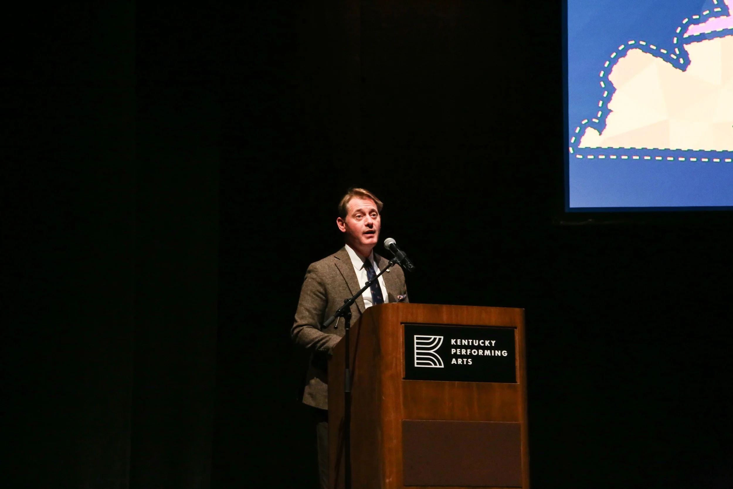 Secretary of State Michael G. Adams onstage at The Golden Thread, 2025.
