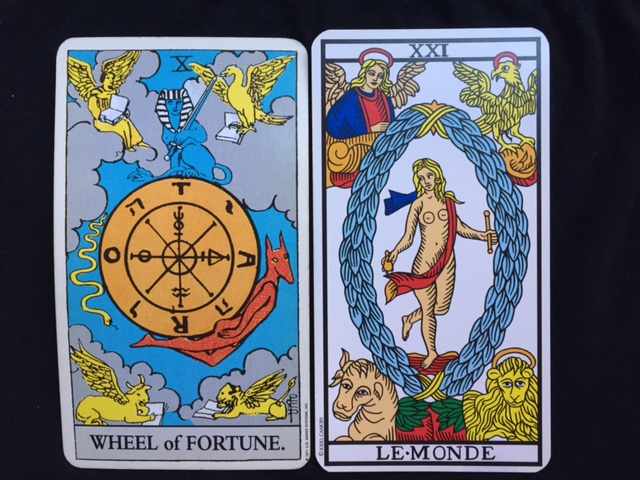 The Wheel of Fortune is from the Rider-Waite-Smith deck, and The World is from the Tarot of Marseilles.