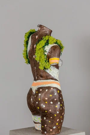 Africa Resin w/Found Objects on Concrete 25” x 8.5” x 8.5”