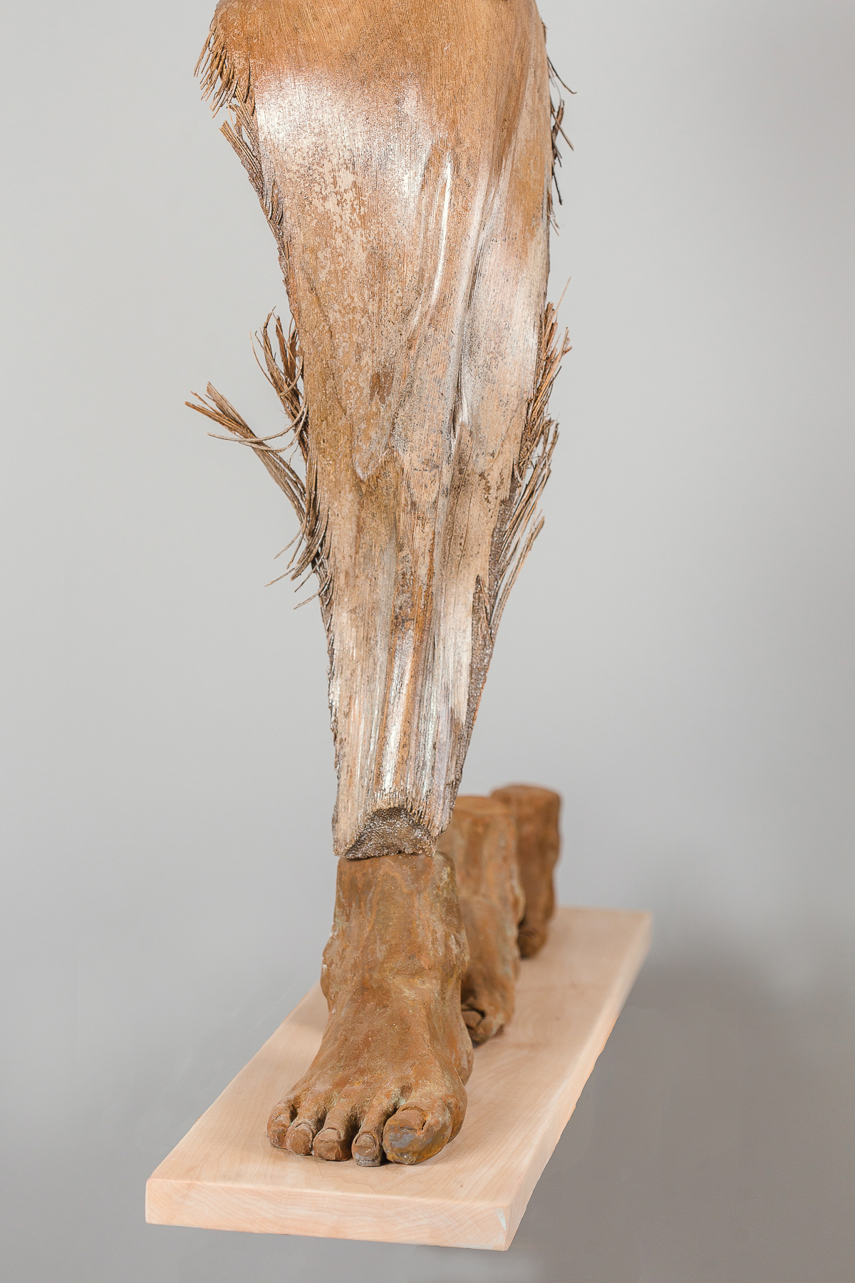  Generation to Generation  High Fired Clay with palm frond  29” x  35” x 8” 