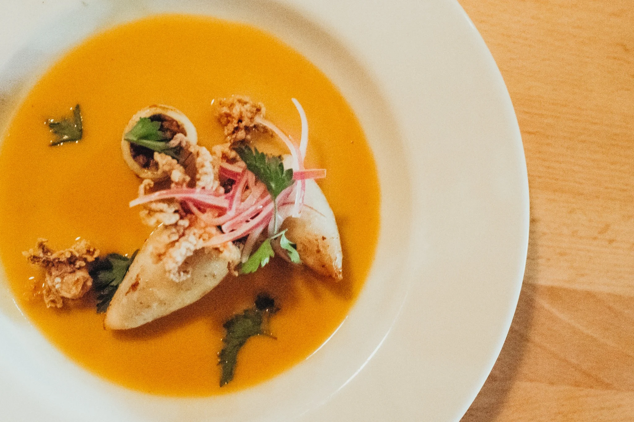 black rice stuffed squid shot by Rebecca Aranda