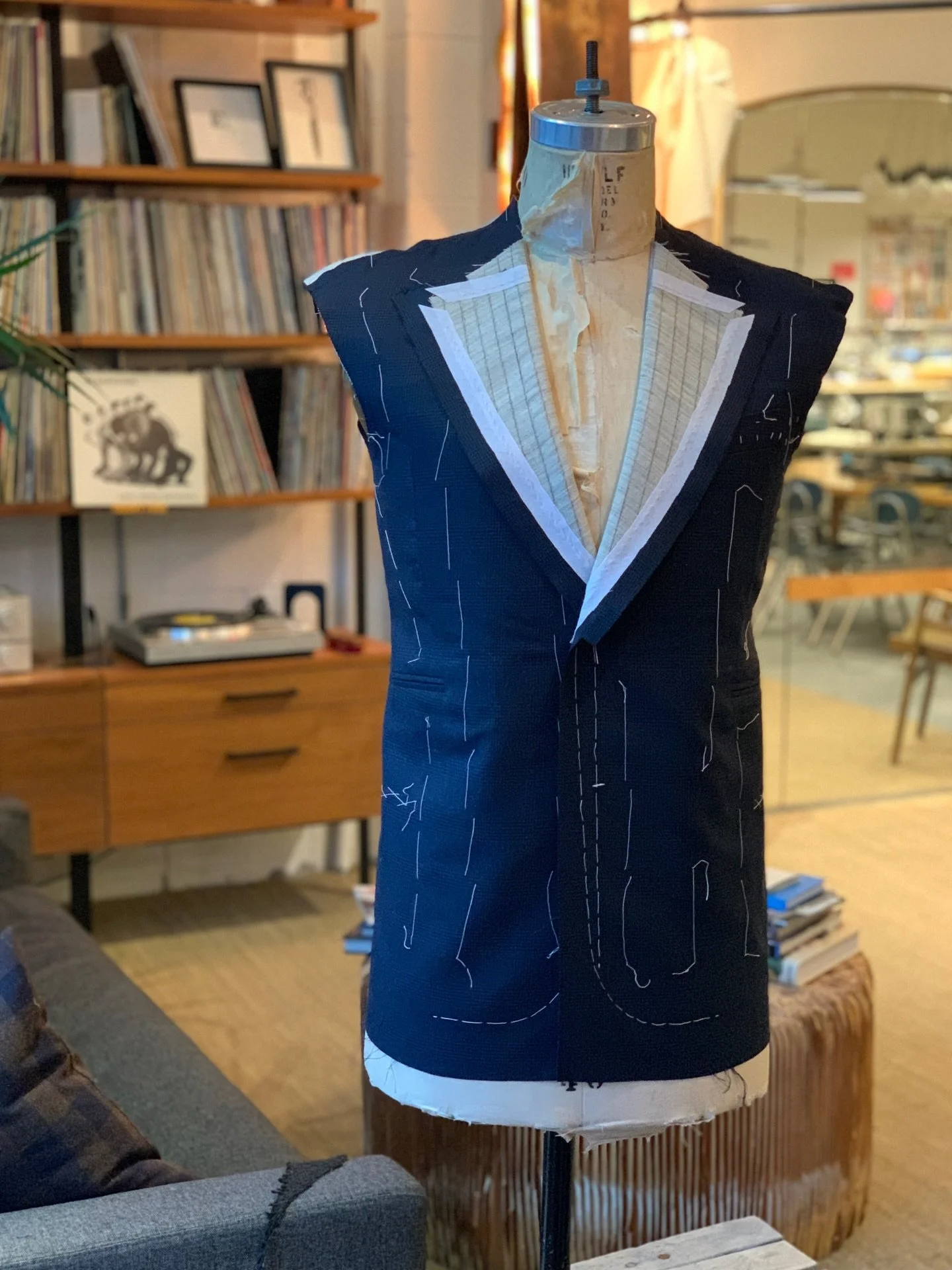 A beautiful single breasted navy plaid jacket is coming together in the shop! Nest step is to attach the front facing.

#bespoke #tailoring #customclothing