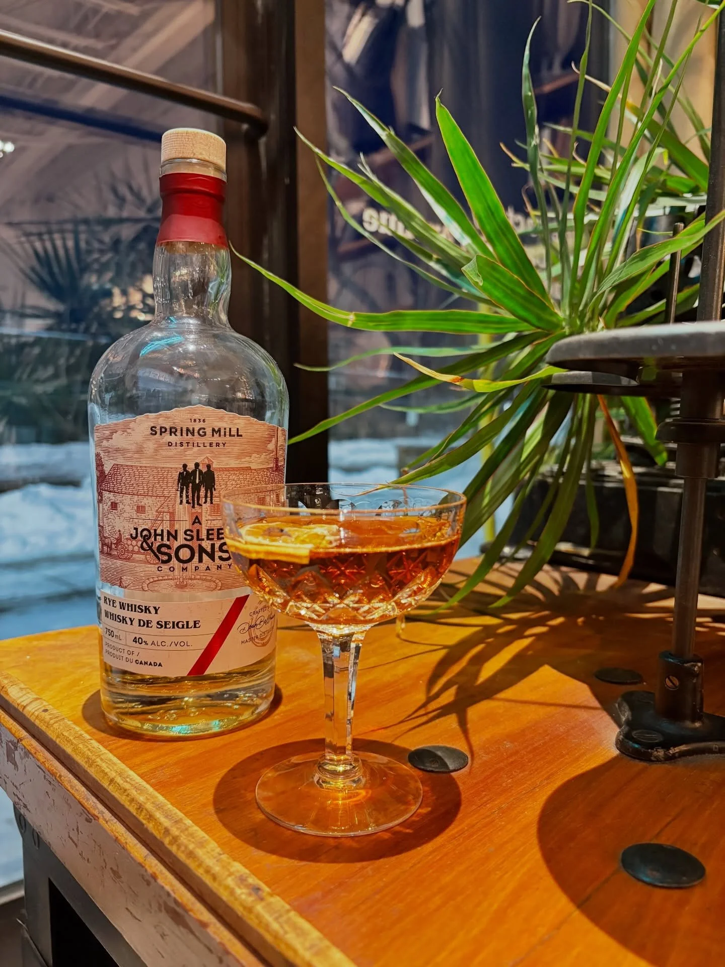 Cold weather like this calls for a strong cocktail!

Rye Manhattan

2oz Canadian Rye Whisky
1/2 Sweet Vermouth 
2 dashes of your favourite aromatic bitters 

Add ingredients to a glass and stir, garnish with an orange wedge