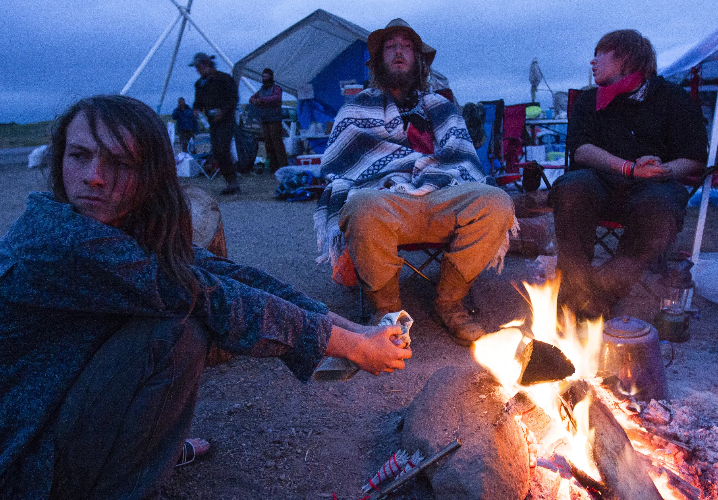 Protesters make a camp along highway 1806 near the DAPL construction site to watch for the possibility of the company working through the night.