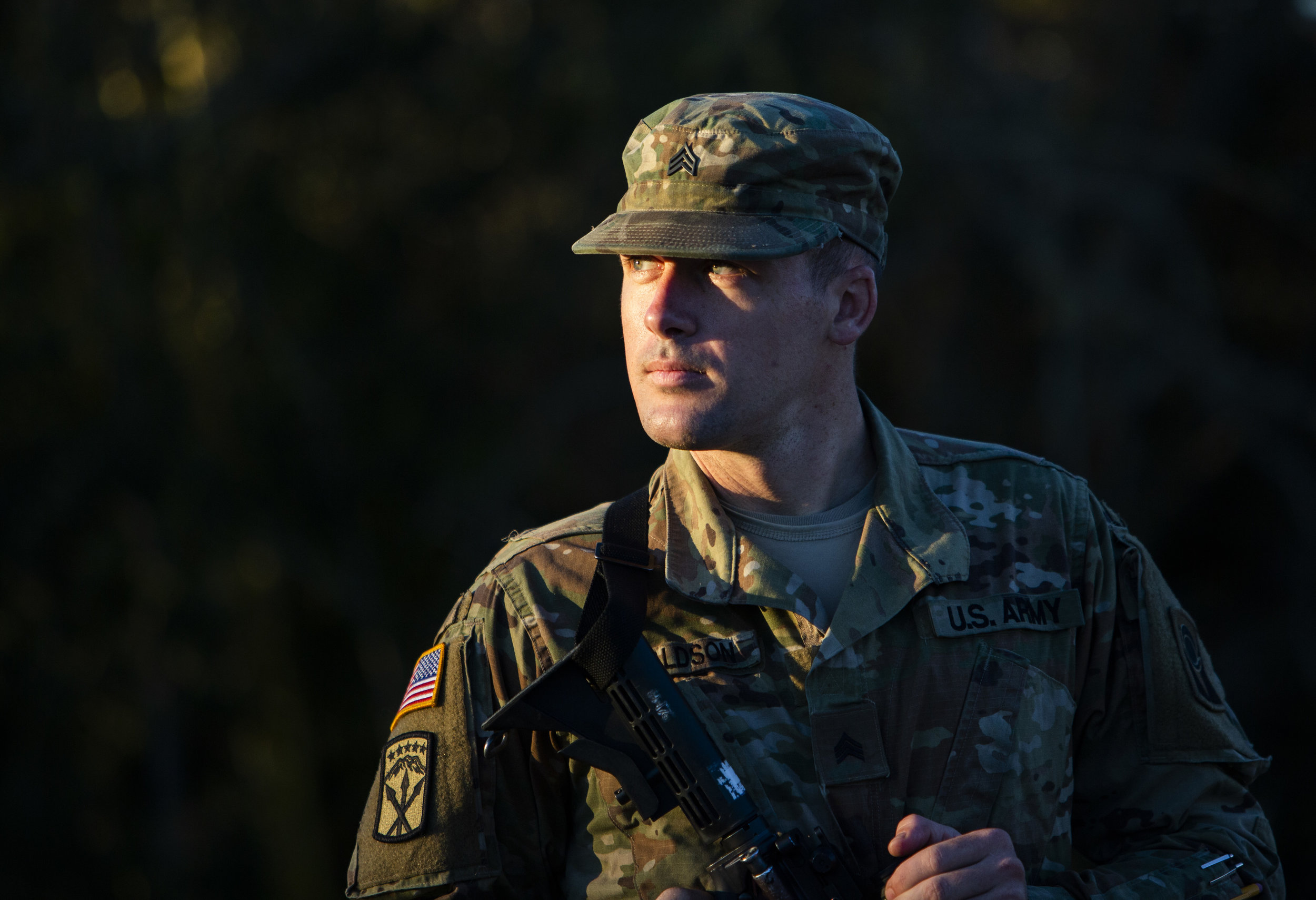 Sgt. Dave Donaldson, 27, of St. Petersburg monitors the road into Alligator drive in Alligator Point on October 12, 2018. The National Guard was called to assist with the road clearance and security after Hurricane Michael.