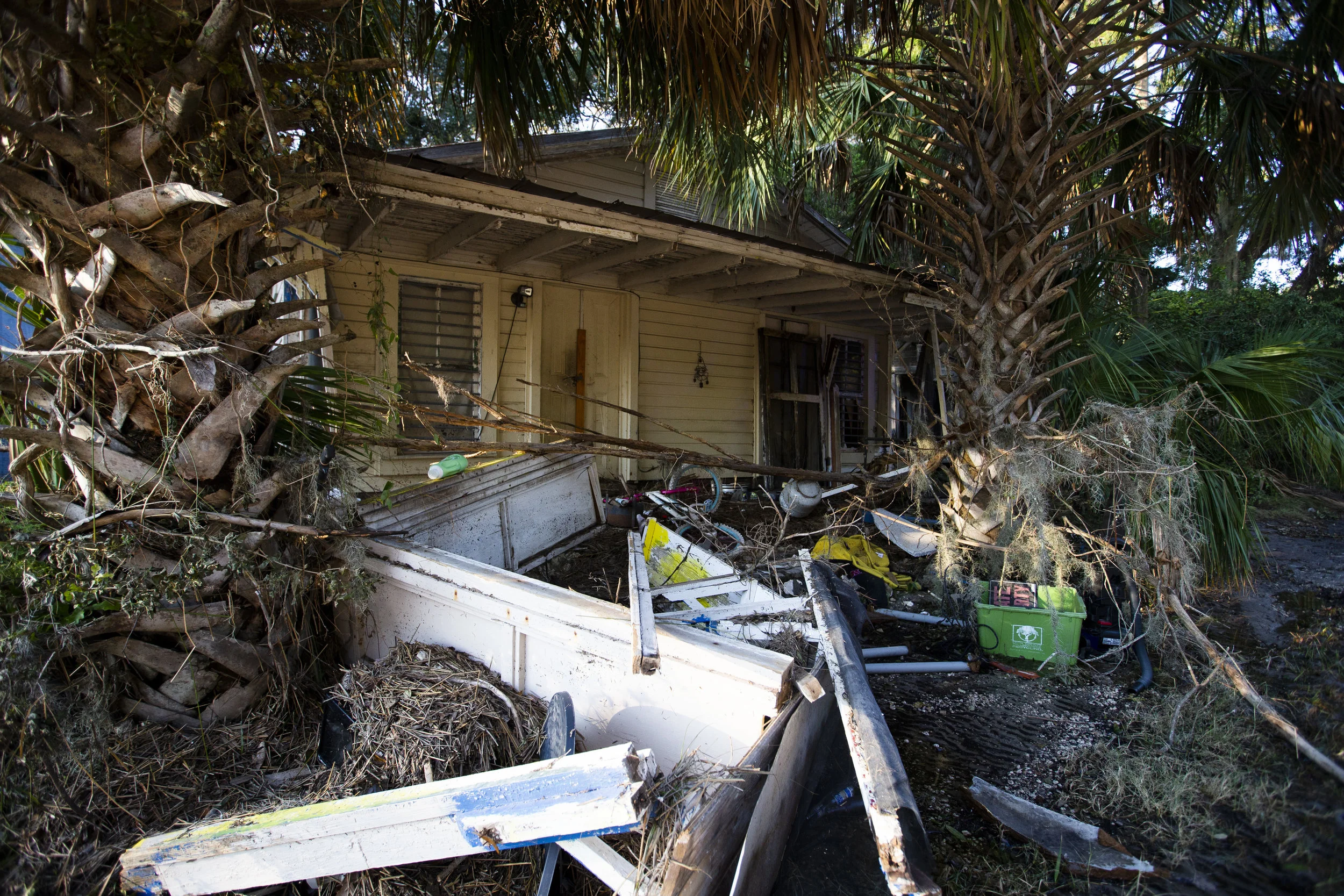 A house sits among debris after Hurricane Michael stormed the area In Spring Creek on October 10, 2018.