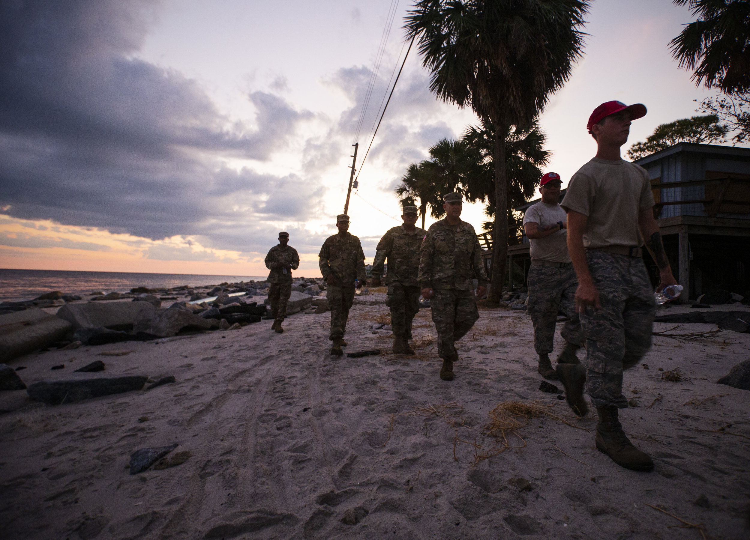 Members of Florida National Guard and the Air Force patrol Alligator Drive in Alligator Point on October 11, 2018, one day after Hurricane Michael hit the area.