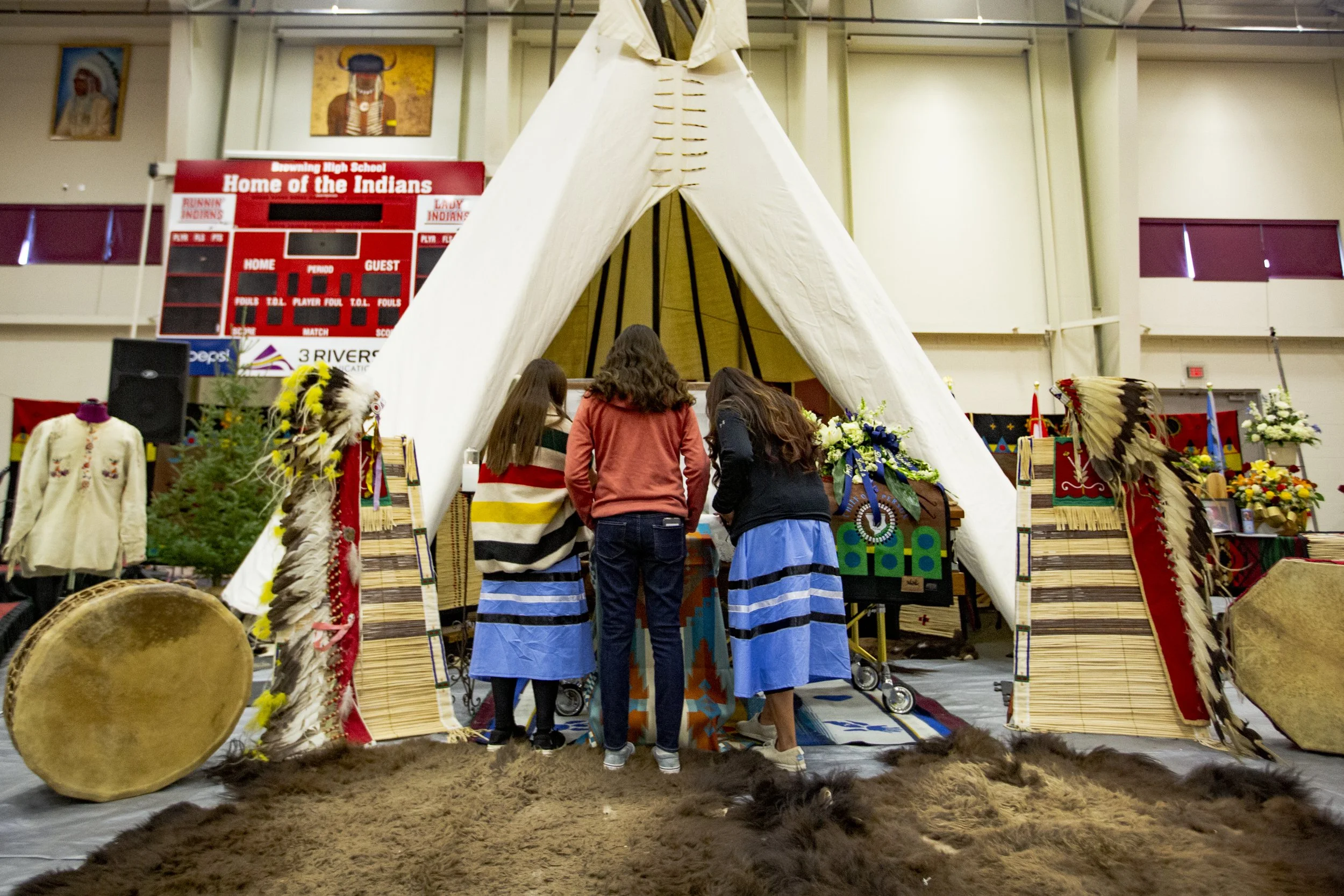  Mourners view the body of Chief Earl Old Person during the funeral held at the Browning High School. 