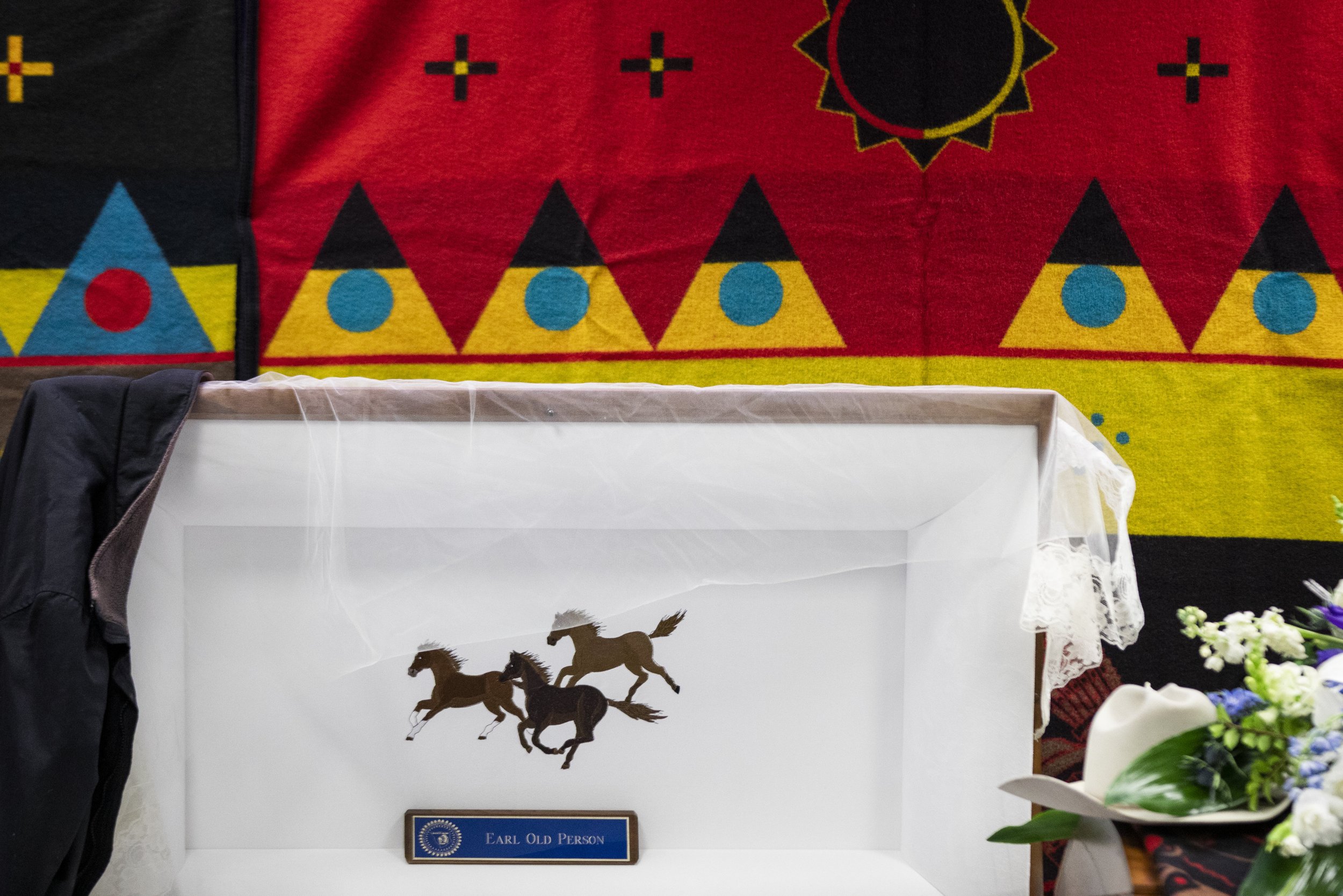  Chief Old Person’s casket lay at the chambers for a day before moving to Browning High School.&nbsp; 