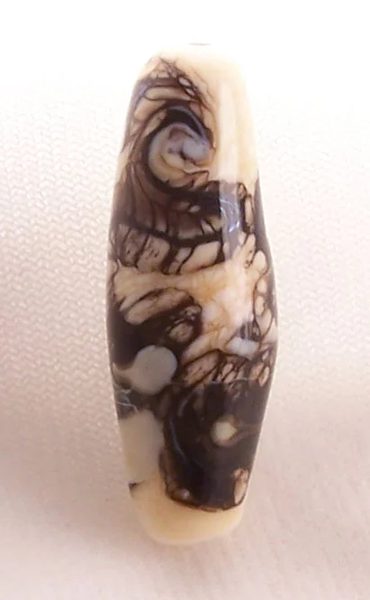 ivory_brown_swirlbead2.jpg