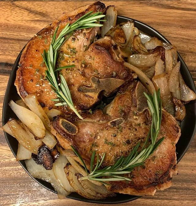 Pan seared thick cut pork chop, garlic roasted asparagus, baked potato with bacon and chives. #porkchop #asparagus #potato #thefighterskitchen