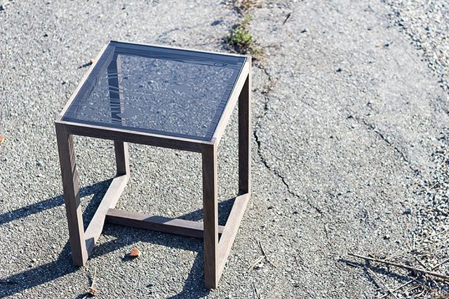The Etcher // wood end table with laser etched glass surface; The Etcher table borrows its name from Dutch graphic artist and master of illusion M.C. Esher. With its original wood etched glass surface, the goal of this piece was to blend the lines be