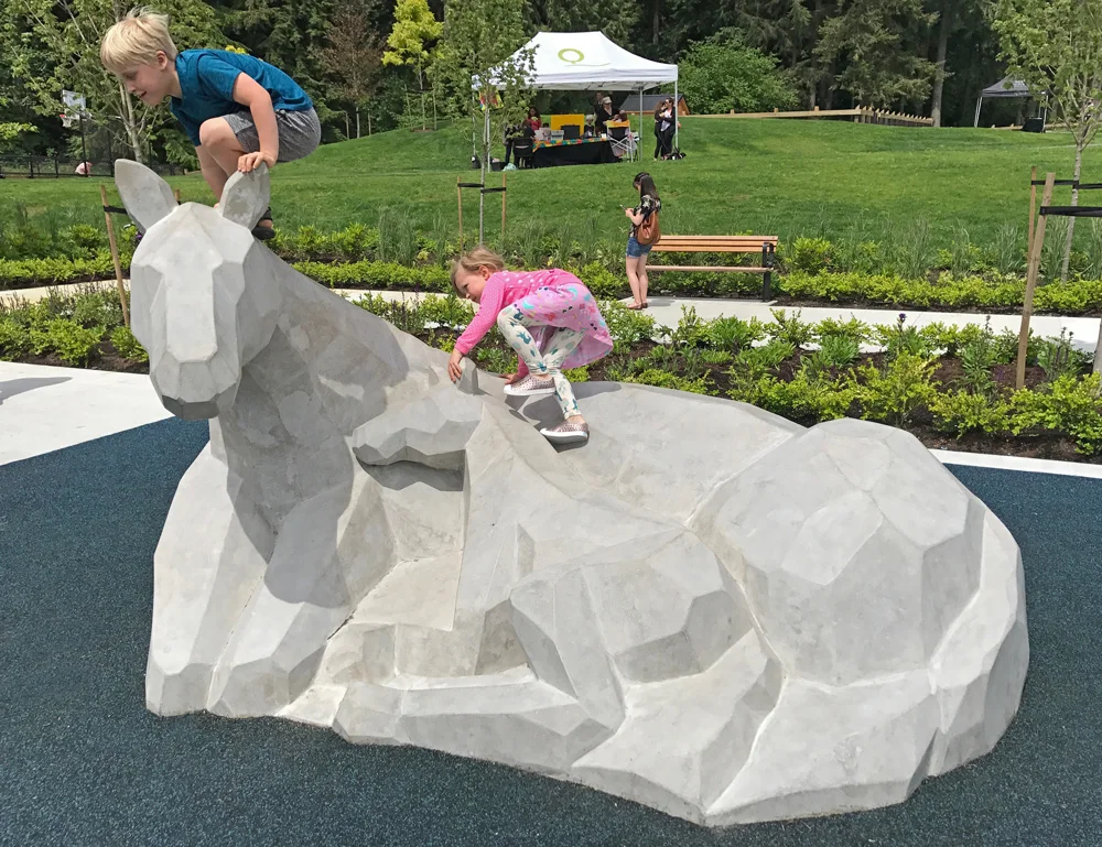 My kids climbing the play sculpture equipment made by dad (aka Wavestone Sculpture)