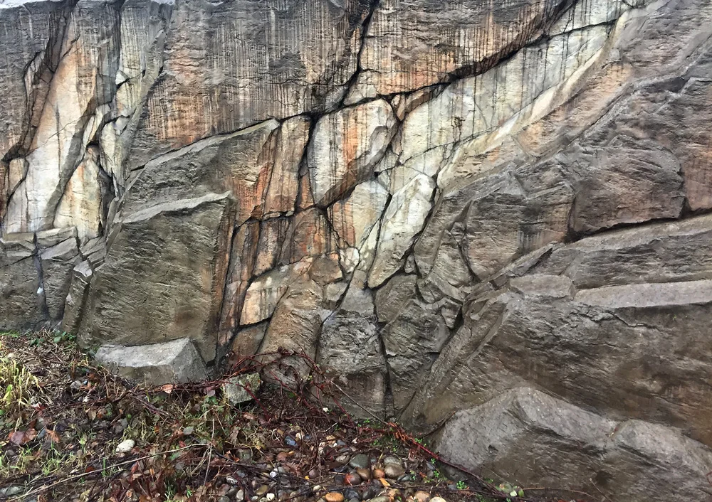 Basalt Rock Retaining Wall North Vancouver BC made with hand sculpted concrete!