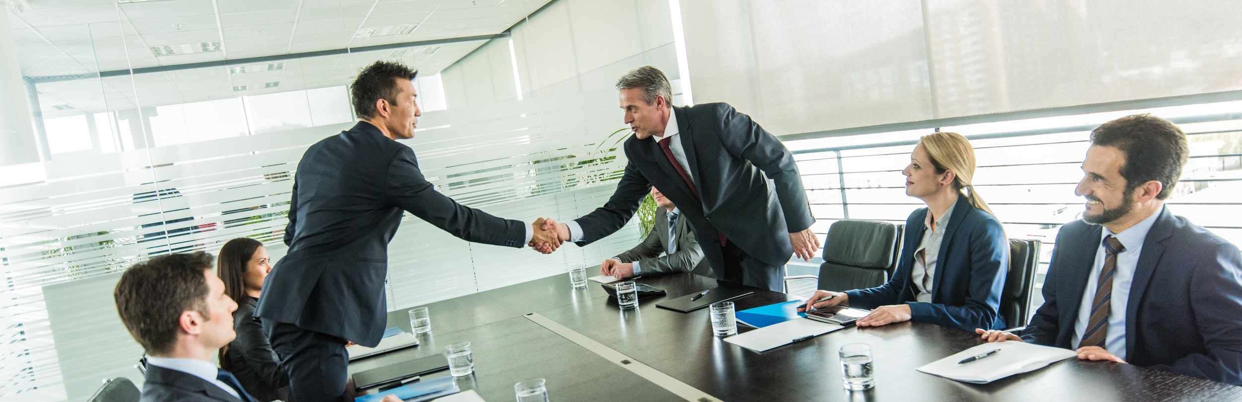 handshake in board room.jpg