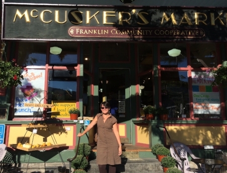 My team mate Robin Mullaney standing in front of McCuskers Market in Shelburne Falls, MA