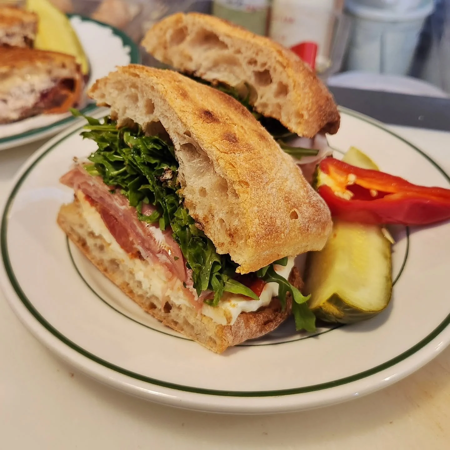 Winter Caprese on special by Alex - prosciutto, slow-roasted tomatoes, fresh mozzarella, arugula and house-made balsamic vinaigrette on BMB ciabatta. Yommmm.