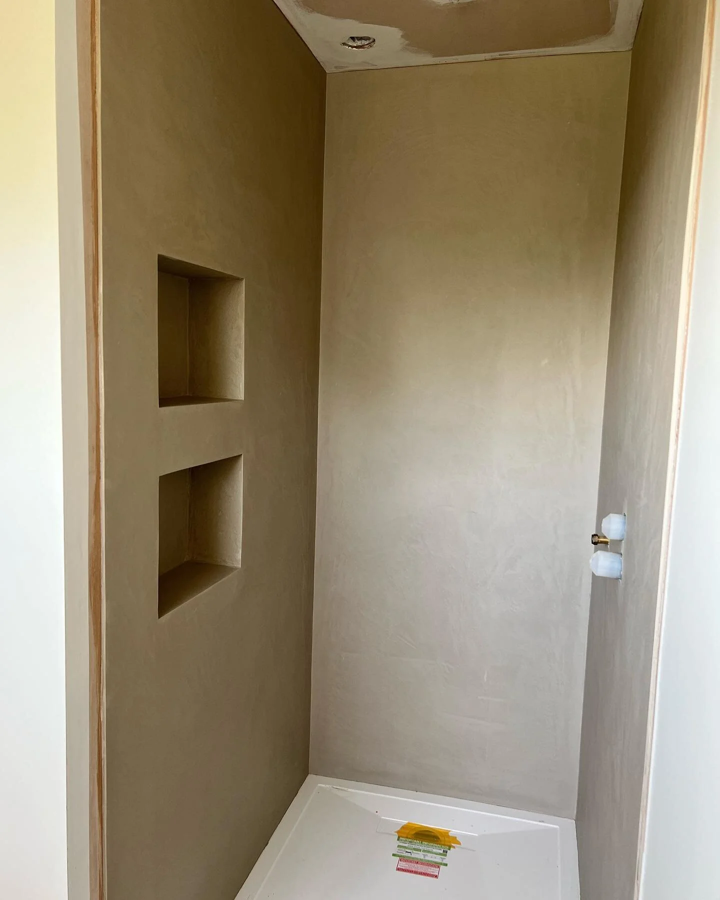 Our showers are ready for the finishing touches now that Craig of @limeandmarble has finished installing &lsquo;belt and braces&rsquo; @forcrete_ to the walls. 
.
.
.
#forcrete #microcement #limeandmarble #polished #bathroom #shower #texturedfinishes