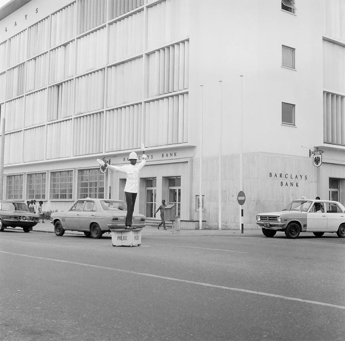©James Barnor, Accra, 1970’s. Policeman directing traffic at a junction.