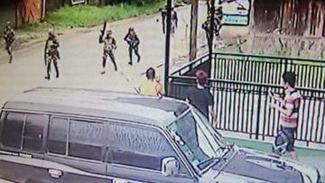 Armed men are seen in Marawi City on May 23, 2017.