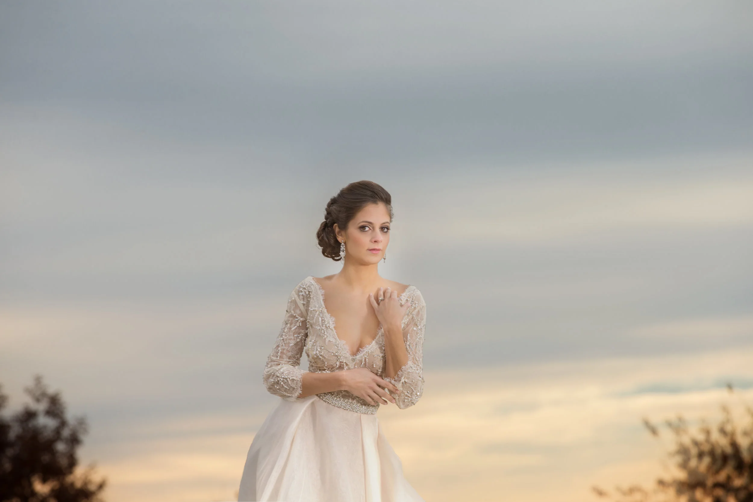 Monique Lhuiller gown from the Plumed Serpent Bridal, Hair and Make up by Arleigh Cole