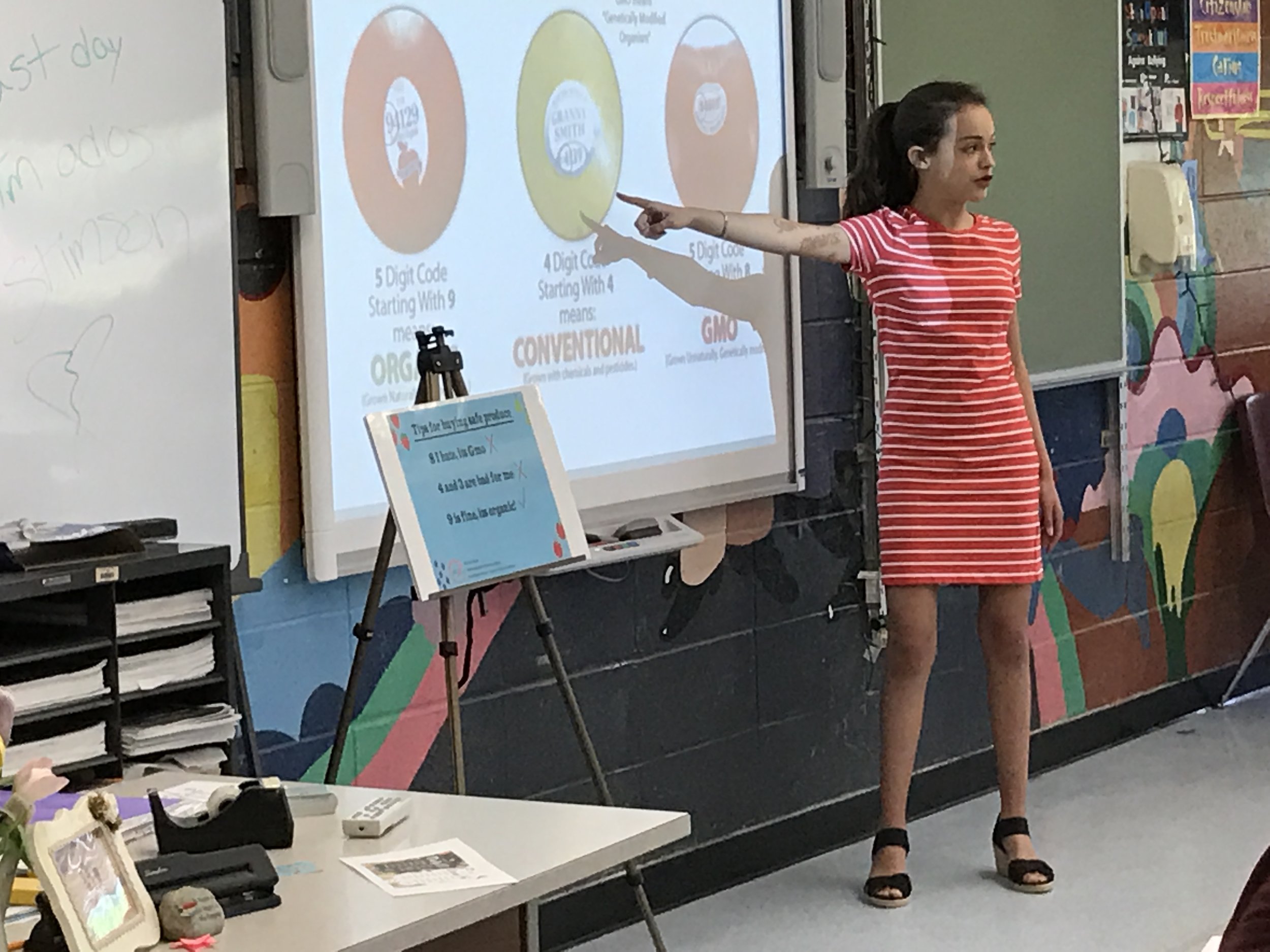 Lila Freire teaches her classmates on chemicals in food