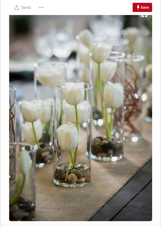 A simple arrangement of tulips in water make for an elegant and beautiful centerpiece.