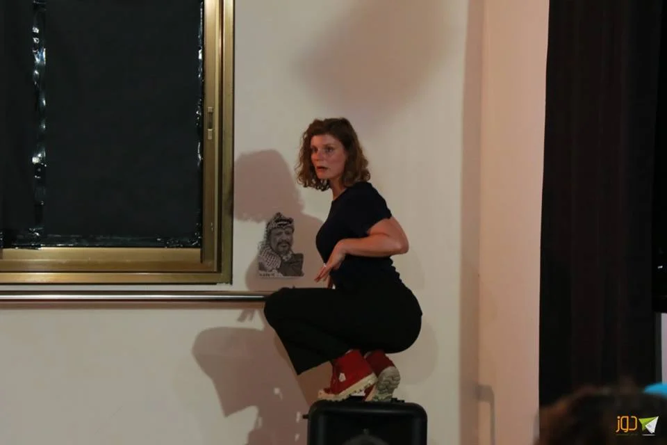 Two ladybugs at Arts Hub in Nablus-Nona Buhrs playing a headless chicken running in circles with a lot of pain.jpg