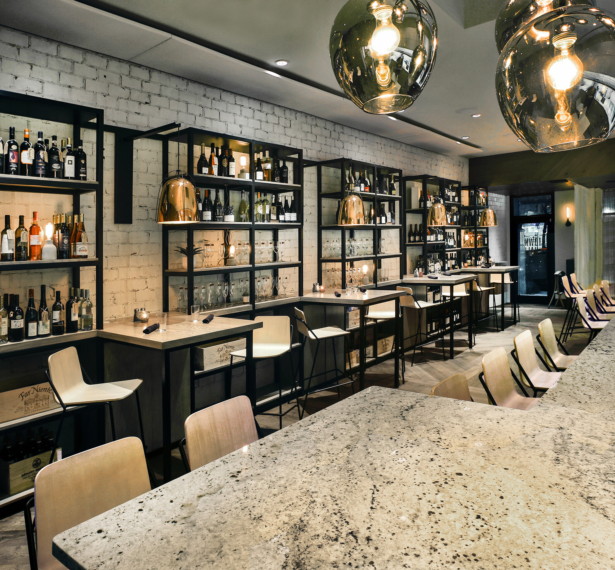 Bar seating and wall of wine shelving at Town Hall restaurant in Jacksonville, FL