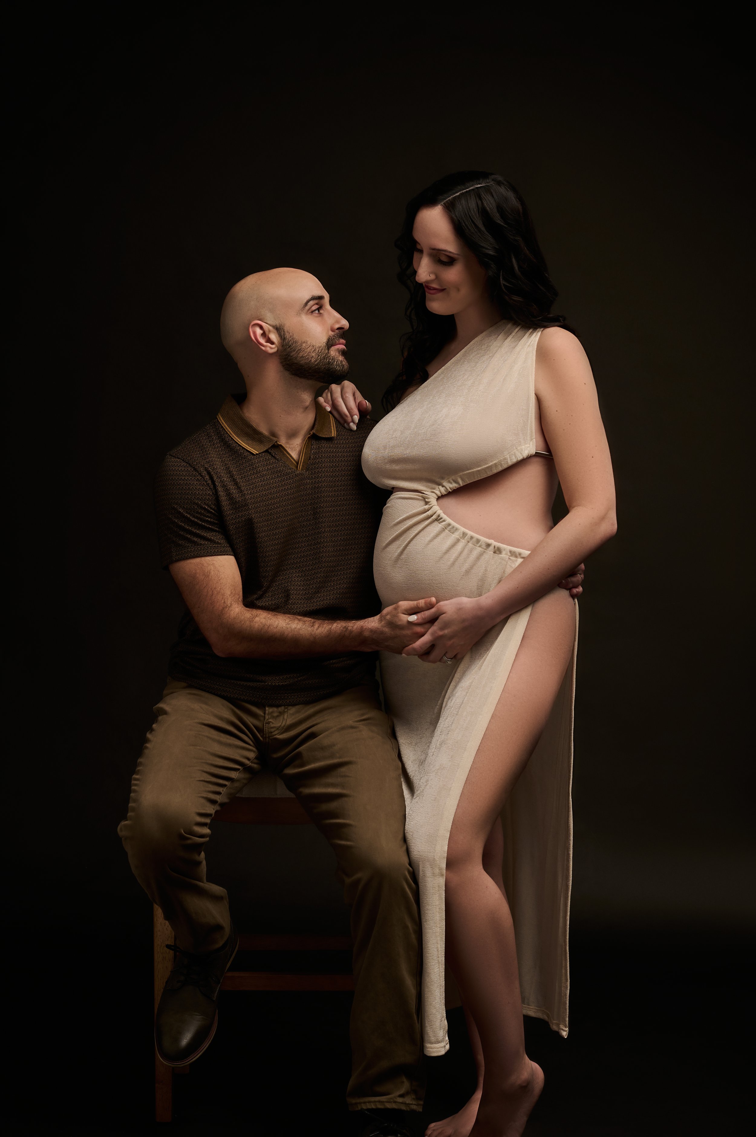 couple posing during in studio photo session.jpg