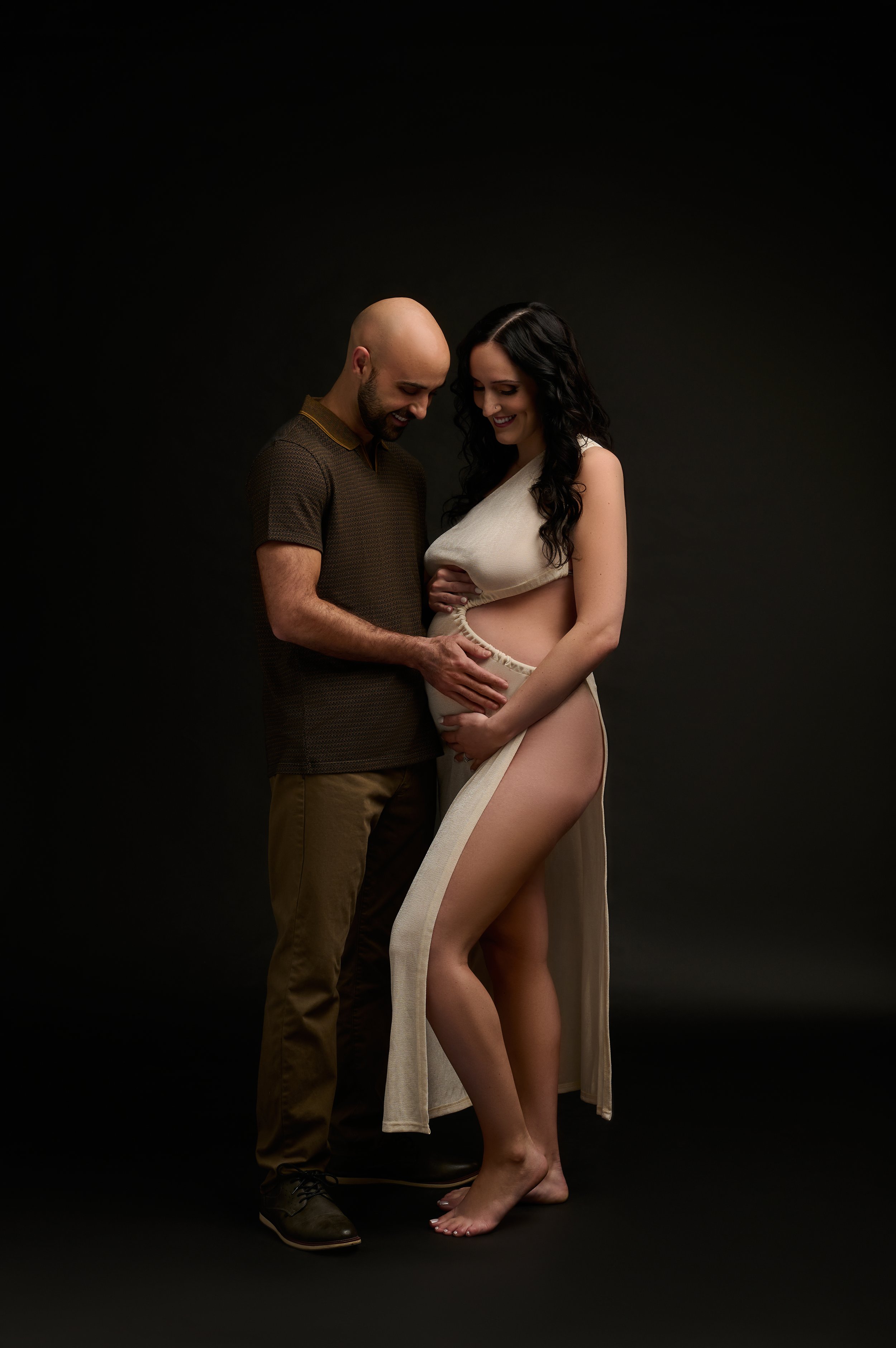couple posing during in studio photo session.jpg
