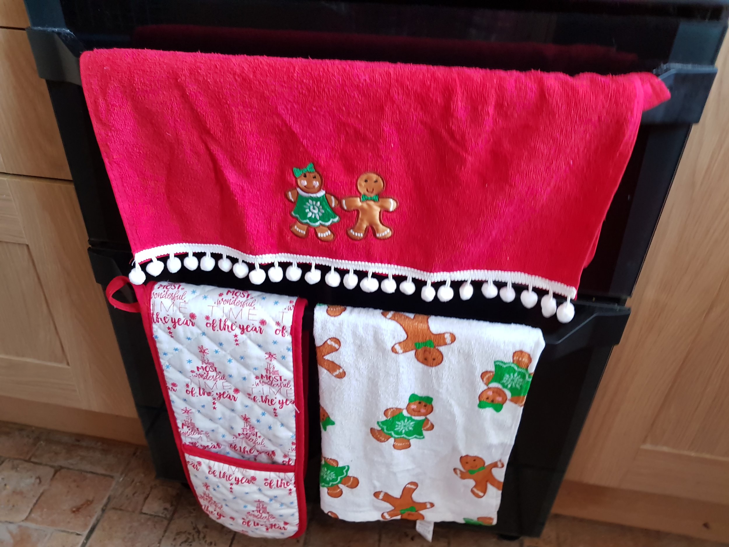 Christmas tea towels and oven gloves