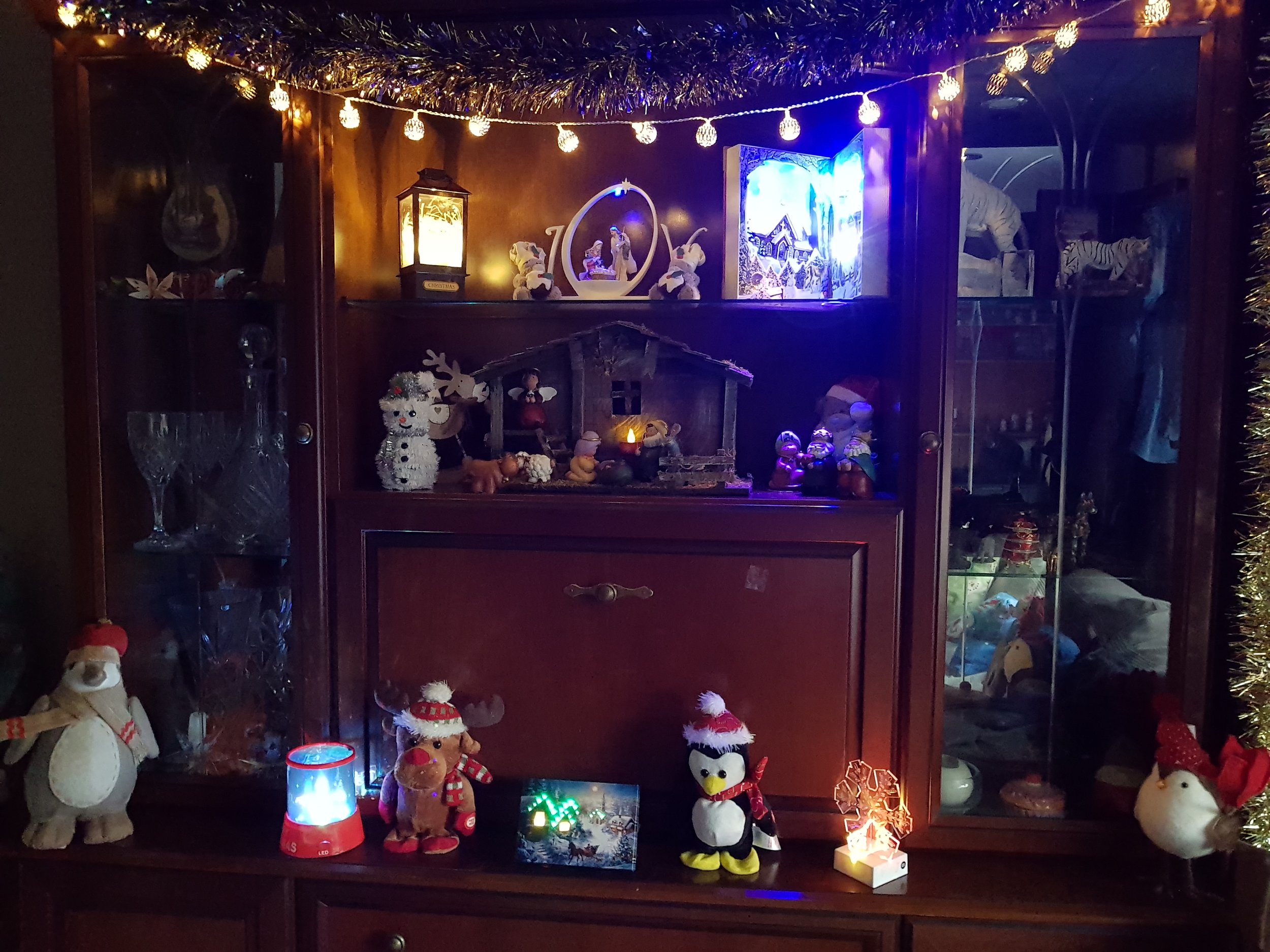 Sideboard full of Christmas decorations and lights