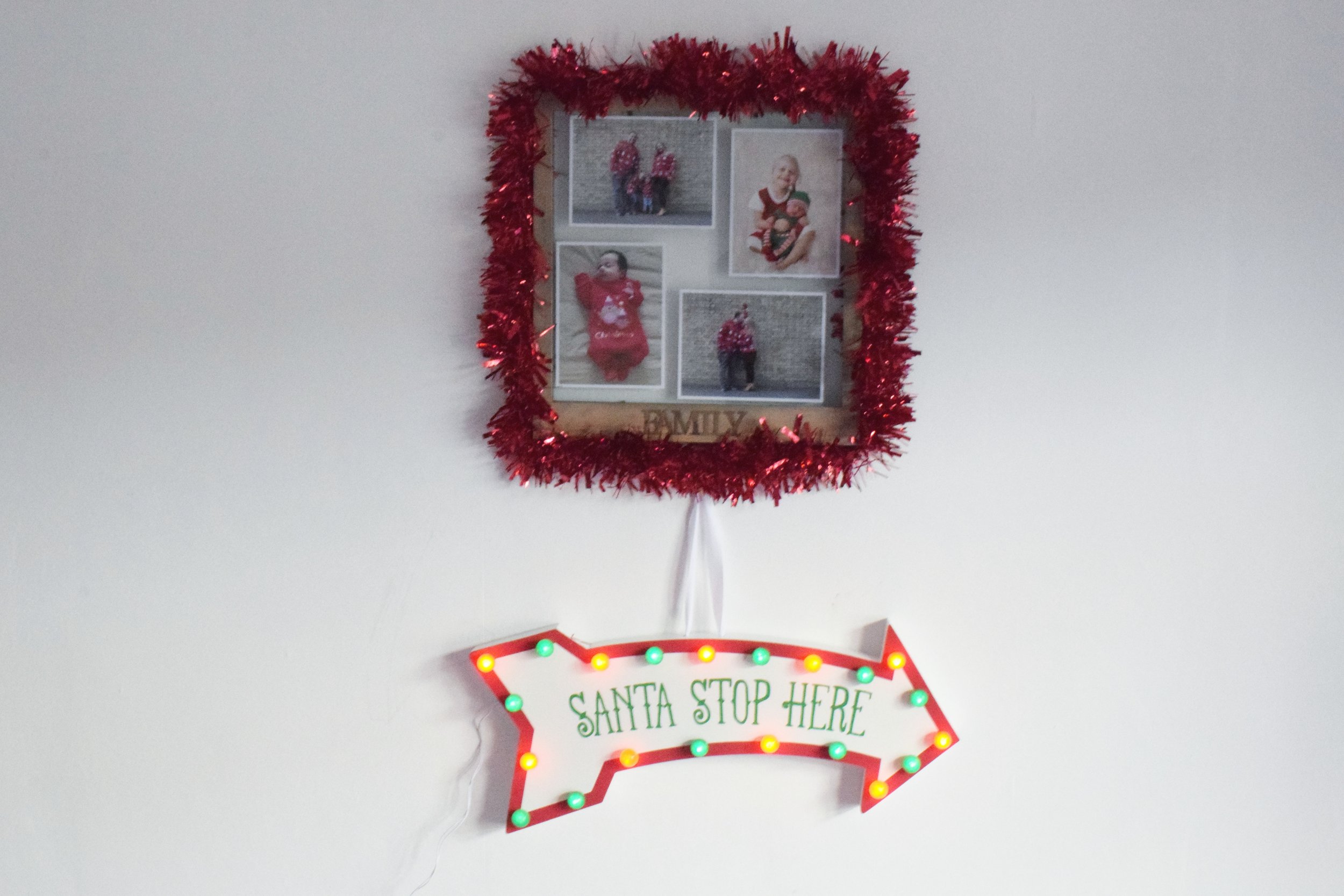 Christmas photo frame and Santa stop here sign