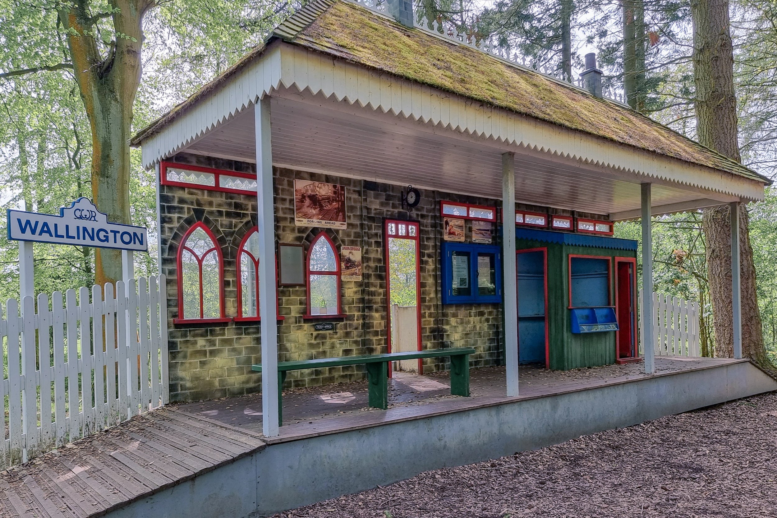 A play station, complete with sign saying, "Wallington", a ticket office window and an office for the station master.