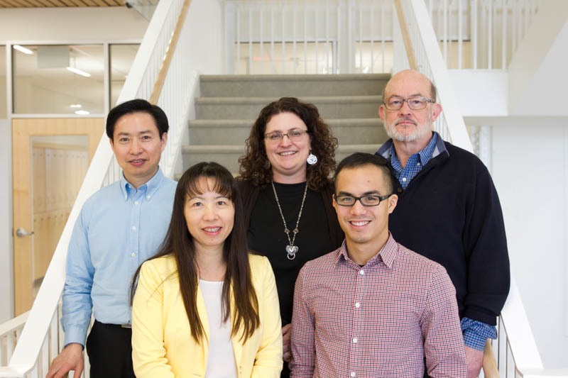 (back row, L-R) Shunqiang Li, Sherri R. Davis, R. Reid Townsend (front row, L-R) Li Ding, Kuan-lin Huang